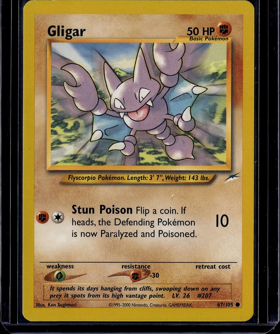 Gligar 67/105 Neo Genesis Pokemon Card - Vintage: This is a vintage Gligar Pokemon card from the Neo Genesis set, released in 2000 by Nintendo. Card number 67/105, this Basic Flying/Scorpio-type Pokemon features the iconic Stun Poison attack that