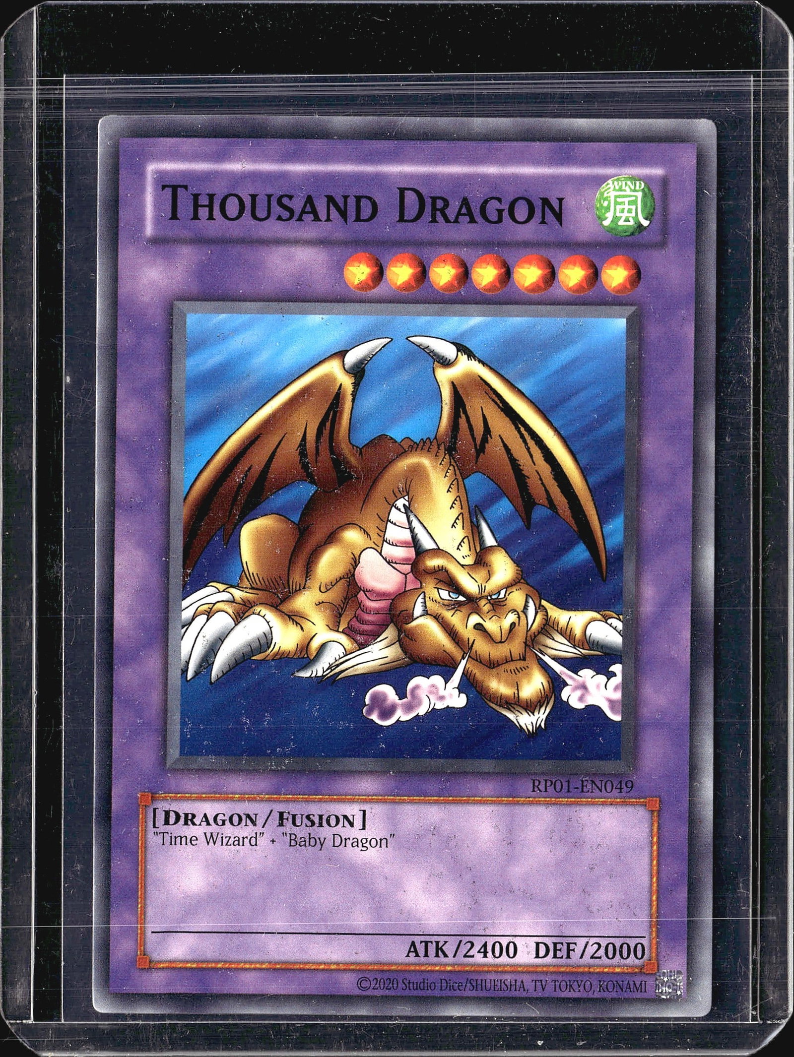 2020 Konami Thousand Dragon Retro Pack 1: This listing features Thousand Dragon, a Dragon/Fusion monster from the Yu-Gi-Oh! Trading Card Game. The card is number RP01-EN049 from the Retro Pack 1 set. Thousand Dragon is a Fusion Monster