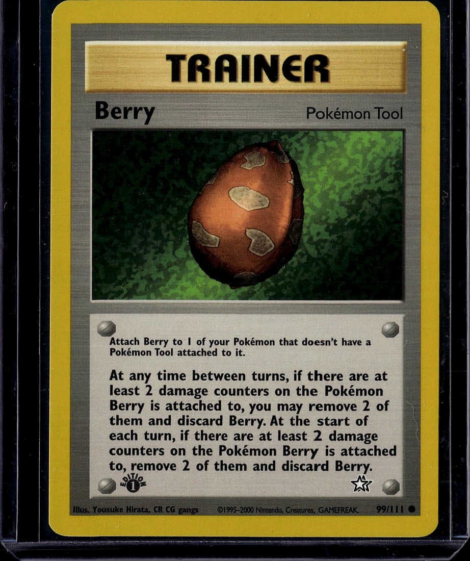 Berry Trainer Pokemon Tool Card Gym Heroes: This is a raw Berry Trainer Pokemon Tool card from the Gym Heroes set, released in 2000. The card number is 99/111 and features iconic artwork by Yousuke Hirata. Berry is a Pokemon Tool that can be