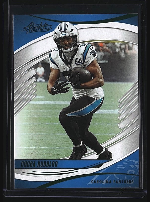 2025 Panini Absolute Football #15 Chuba Hubbard: 2023 Panini Absolute Football #15 Chuba Hubbard raw single card featuring the Carolina Panthers running back. Card shows Hubbard in Panthers white uniform on the field in action pose. Front displays