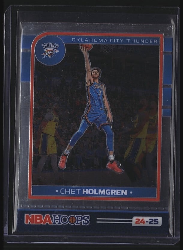2024 Panini NBA Hoops #175 Chet Holmgren: 2024 Panini NBA Hoops #175 Chet Holmgren rookie card from the Oklahoma City Thunder. This is a raw single in mint condition featuring Holmgren in his Thunder uniform shooting a basketball. The card