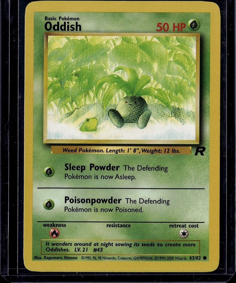 Oddish Base Set 63/82 Vintage Pokemon Card 1999: This is an authentic Oddish Pokemon trading card from the Base Set, released in 1999 by The Pokemon Company and distributed by Wizards of the Coast. Card #63/82 features the classic Weed Pokemon with