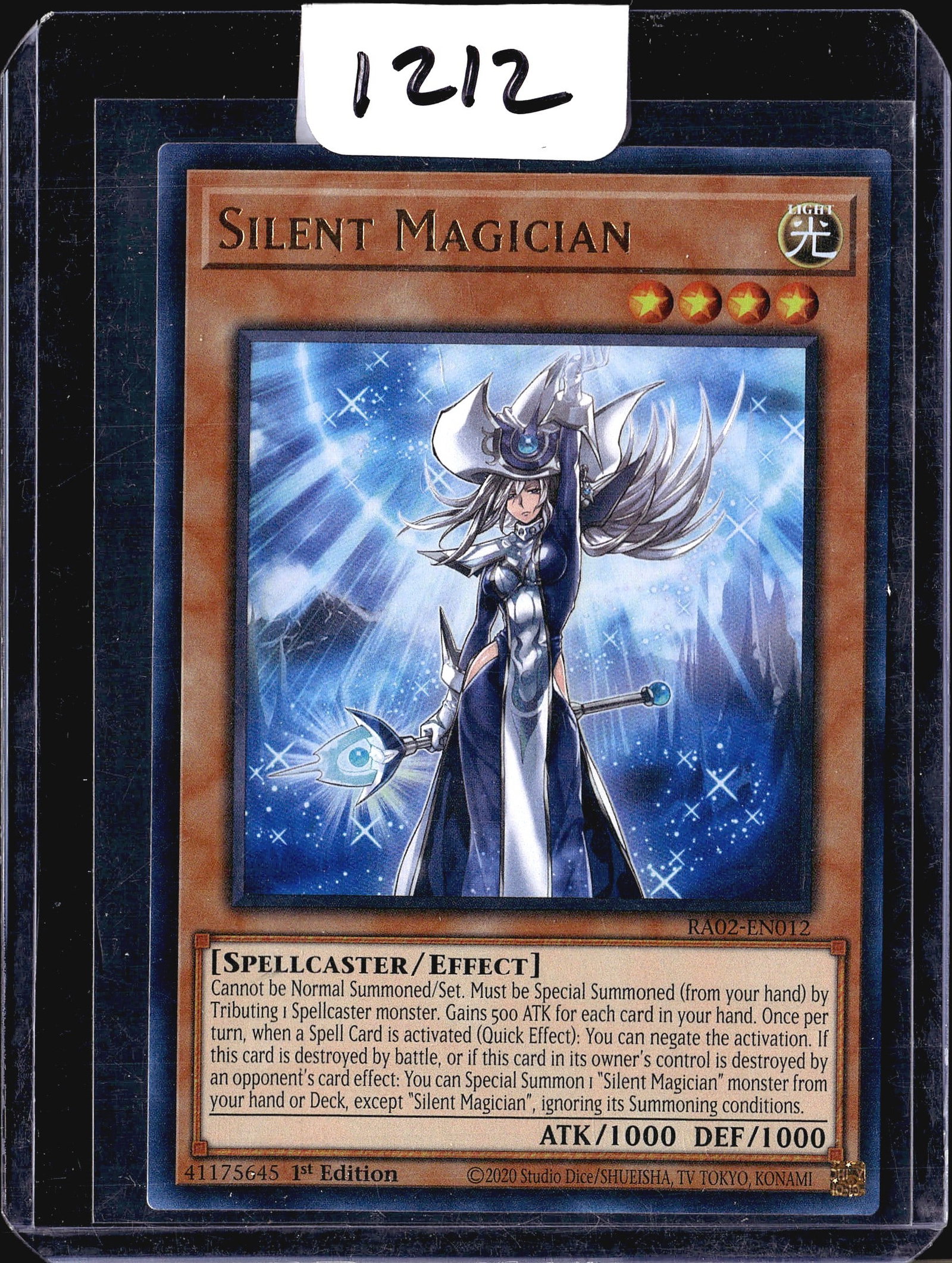 2020 Konami Silent Magician 1st Edition: This listing is for the Yu-Gi-Oh! trading card Silent Magician, card number RA02-EN012, from the RA02 set. The card is a 1st Edition print, as indicated by the stamp visible on the card face. Silent