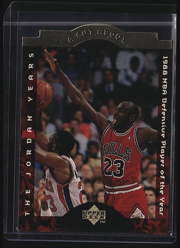 1998 Upper Deck Michael Jordan The Jordan Years: 1998 Upper Deck The Jordan Years Michael Jordan #GJ4 raw basketball card. Features Jordan in his iconic Chicago Bulls #23 jersey during game action. Card showcases Jordan's defensive prowess with text