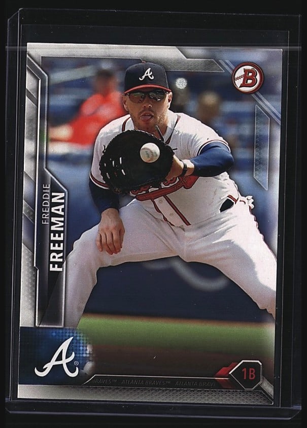 2016 Bowman Freddie Freeman #13 Baseball Card: 2016 Bowman baseball card featuring Freddie Freeman of the Atlanta Braves, card number 13. This is a raw single in mint condition. The card displays Freeman in fielding position wearing his Braves uni
