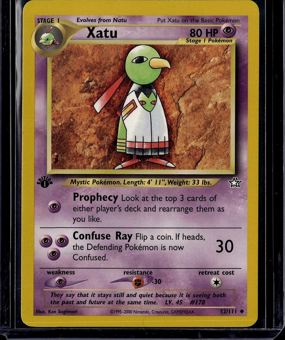 Xatu Neo Revelation 52/111 Pokemon Card - Stage: This is a vintage Pokemon trading card featuring Xatu, a Stage 1 Psychic-type evolution from the Neo Revelation set (52/111). Released in 2000, this card showcases the classic Ken Sugimori artwork