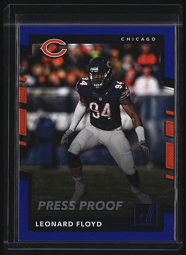 2017 Panini Donruss Leonard Floyd Blue Press: 2017 Panini Donruss Leonard Floyd Press Proof card #294 featuring the Chicago Bears defensive end. This raw single showcases Floyd in action on the field in his Bears uniform. The Press Proof variant