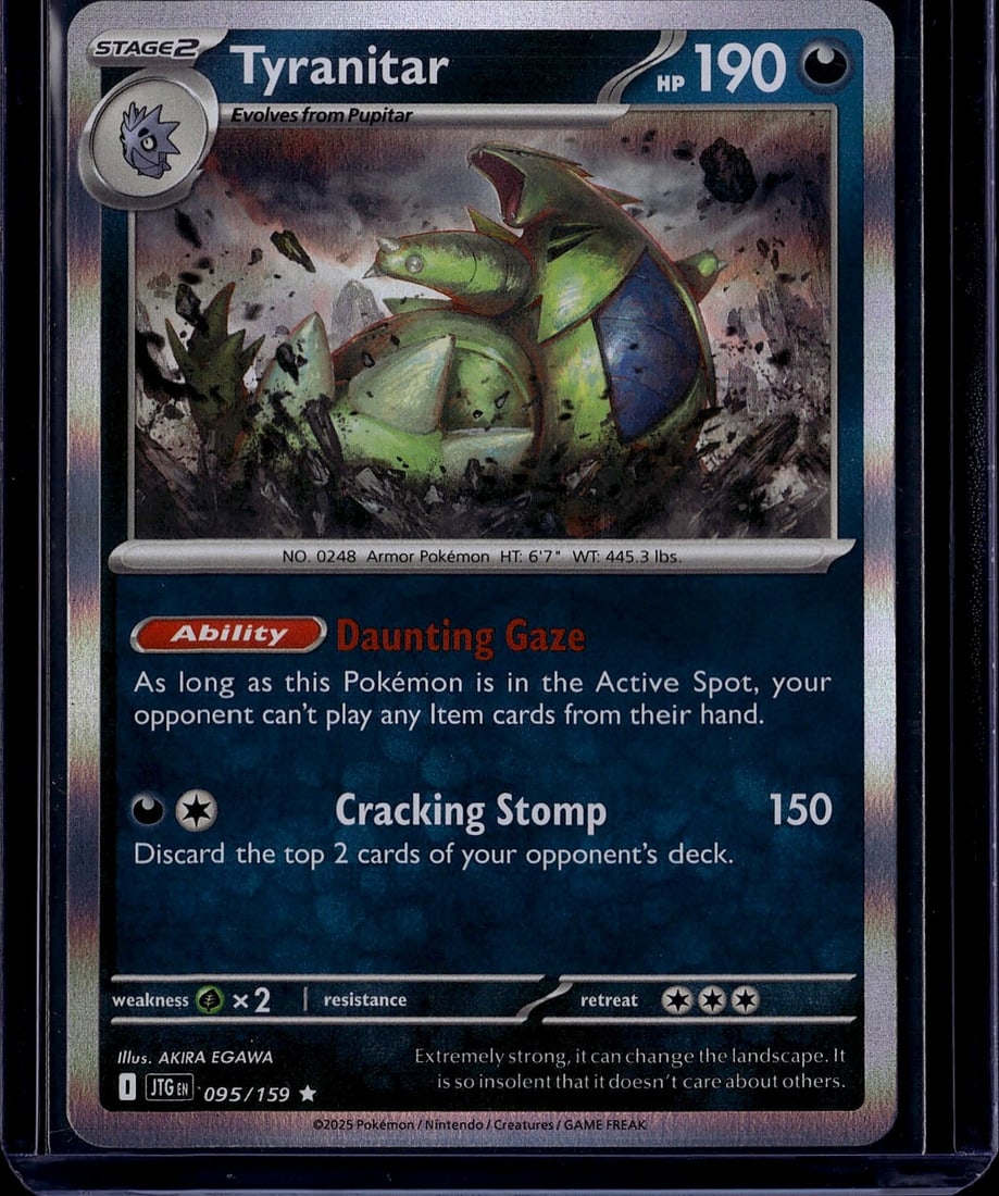 2025 Pokemon Scarlet Violet Journey Together: Tyranitar is a Stage 2 Darkness-type Holo Rare Pokemon card from the Scarlet & Violet: Journey Together expansion (set code SV9), first released in the Japanese Battle Partners expansion. The card