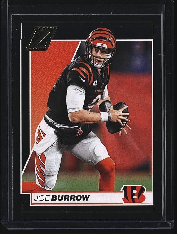 2020 Panini Absolute Joe Burrow #1 Football Card: 2020 Panini Absolute Joe Burrow #1 card in raw condition. Features the Cincinnati Bengals quarterback in his professional uniform. The card displays vibrant team colors with the distinctive Absolute