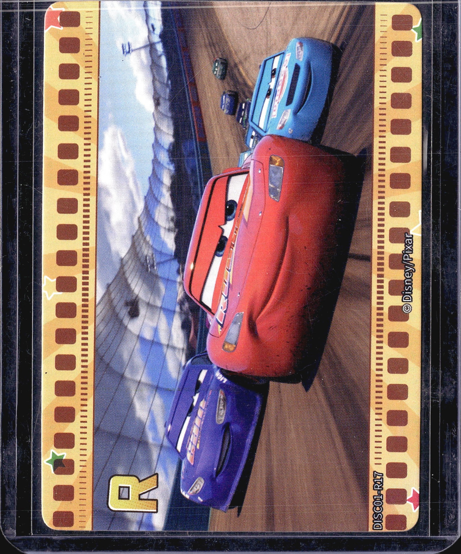 2023 Card.Fun Disney 100 Lightning McQueen: This Disney/Pixar Cars trading card features Lightning McQueen, the iconic red race car from the beloved Pixar animated film, depicted in a dynamic racing scene alongside other competitors on a