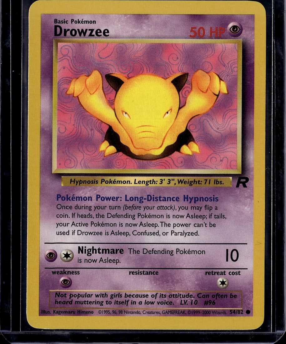 Drowzee Base Set 54/82 Pokemon Card 1999 Vintage: This is a vintage Drowzee Pokemon card from the Base Set, published in 1999 by The Pokemon Company and printed by Wizards of the Coast. The card features artwork by Kagemaru Himeno and showcases this