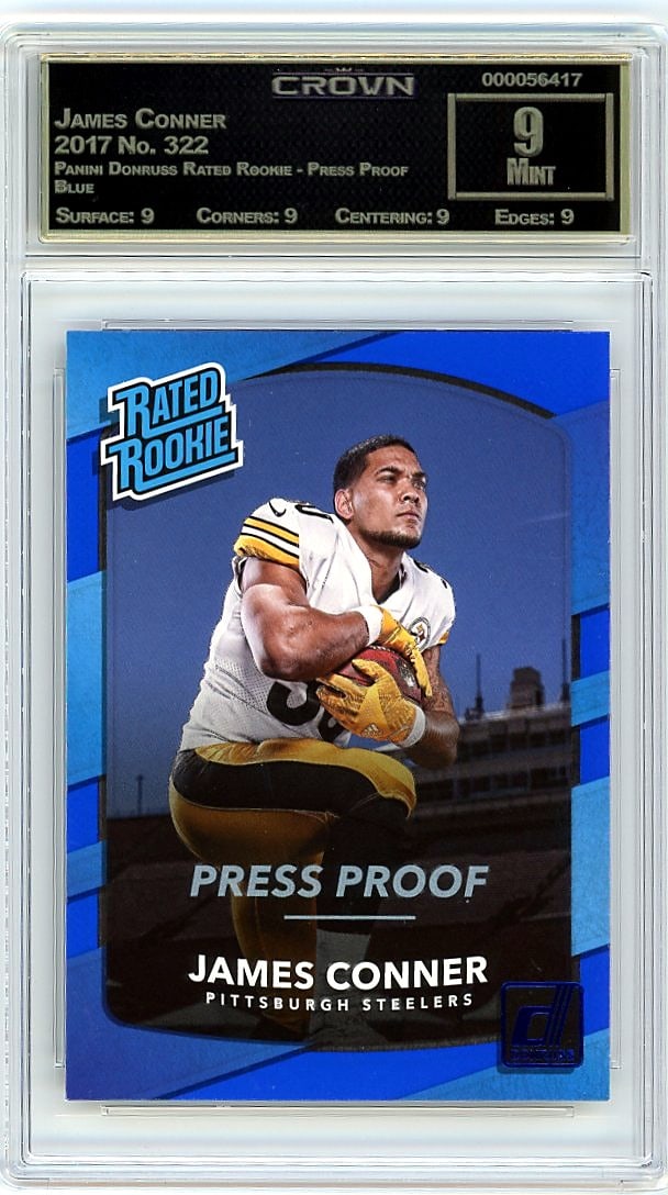 2017 James Conner Panini Donruss Rated Rookie: This is a 2017 James Conner Panini Donruss Rated Rookie Press Proof Blue card, number 322. The card captures Conner as a rookie in the Donruss set, featuring the sought-after Press Proof Blue