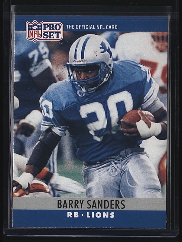 1990 Pro Set Barry Sanders #102 Football Card: 1989 Pro Set Barry Sanders #102 RB Lions football card in raw (ungraded) condition. This is a classic early Pro Set release featuring Barry Sanders in a Detroit Lions uniform, shown carrying the