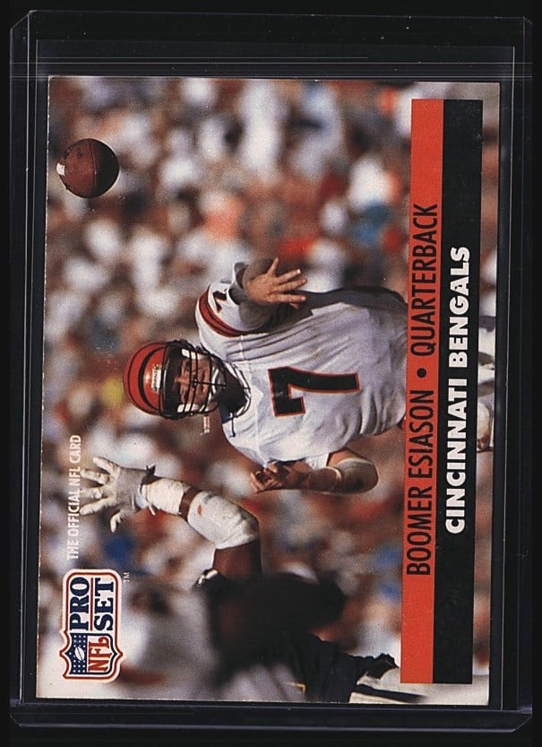 1991 Pro Set Boomer Esiason #111 Football Card: Raw 1988 Pro Set Boomer Esiason #7 football card featuring the Cincinnati Bengals quarterback. This vintage Pro Set release captures Esiason during his Hall of Fame career. The card displays typical