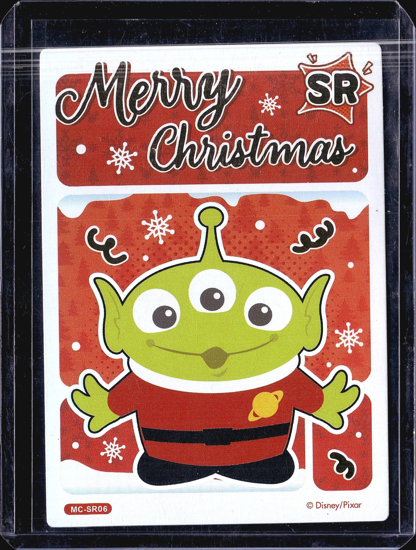 2023 Card Fun Disney 100 Years Festival Merry: This Disney/Pixar collectible card features the beloved Little Green Alien from Toy Story dressed in a festive Santa Claus outfit against a red holiday background. The card is numbered MC-SR06 and