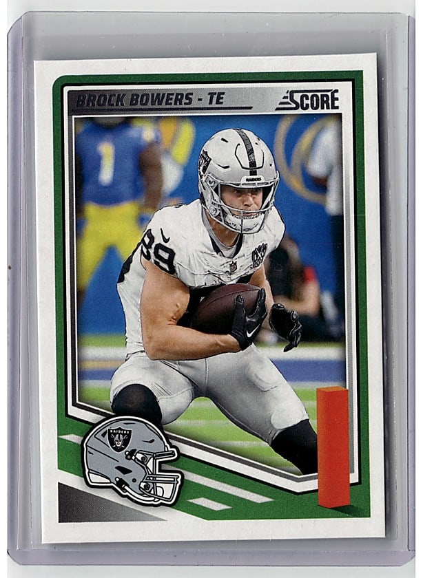 2025 Panini Score Brock Bowers #36 Football Card: This is a 2025 Score #36 Brock Bowers card featuring the Las Vegas Raiders tight end in action during a game. The card showcases Bowers in his white Raiders uniform with the team's helmet logo
