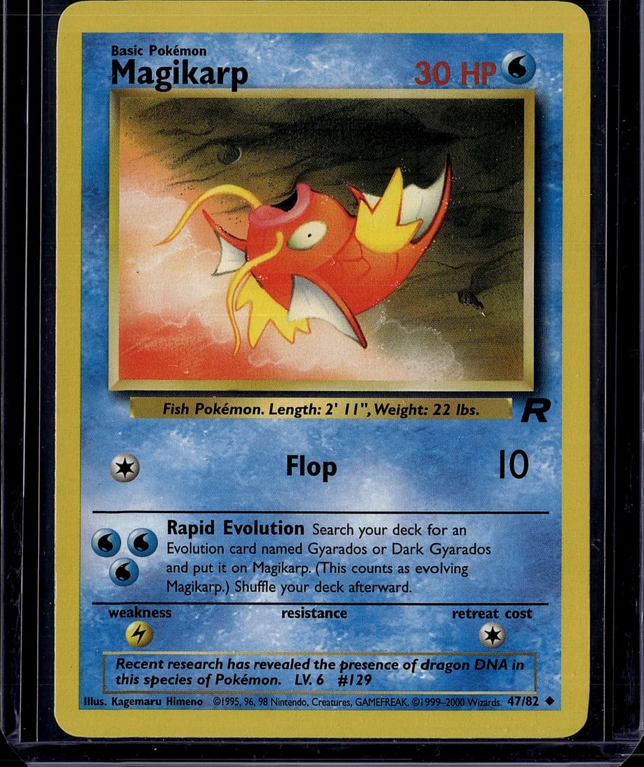 Magikarp Base Set 47/82 Pokemon Card 1999: This is an authentic Magikarp Pokemon Trading Card from the iconic Base Set, released in 1999 by Wizards of the Coast. The card features the classic artwork by Kagemaru Himeno, depicting the red and