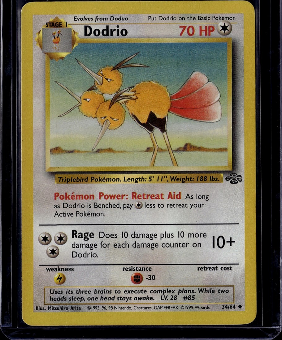 1999 Pokemon Base Set Dodrio Card 34/64 - Stage: This is an authentic 1999 Pokemon Base Set Dodrio card (34/64), a Stage 1 evolution card featuring the iconic Triplebird Pokemon. Dodrio stands 5'11" tall and weighs 188 lbs according to the card's
