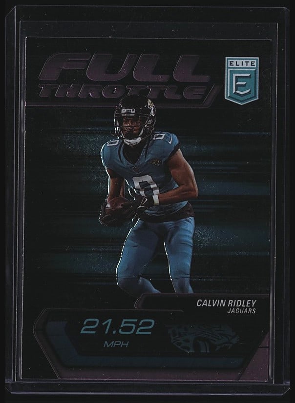 2024 Panini Donruss Elite #11 Calvin Ridley: 2024 Panini Donruss Elite Football #11 Calvin Ridley Jacksonville Jaguars raw single card. Features Ridley in Jaguars uniform with game action imagery. Card includes descriptive text on reverse