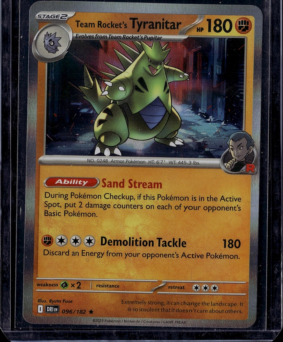 Team Rocket's Tyranitar 096/182 Pokemon Scarlet: This is a Team Rocket's Tyranitar Stage 2 Pokemon card from the modern Scarlet & Violet era, featuring 180 HP and the iconic Tyranitar artwork. The card showcases Tyranitar's evolution from Team