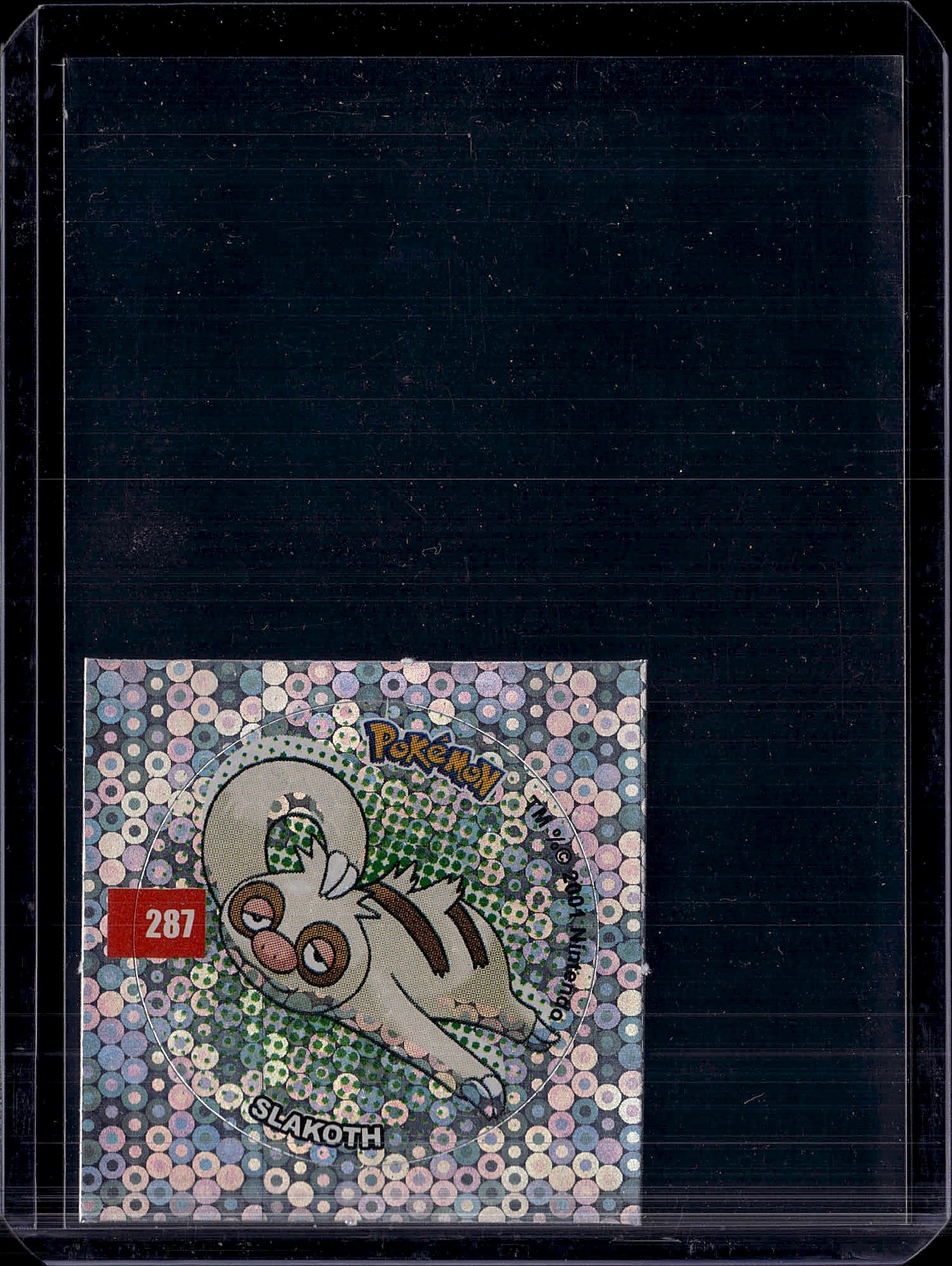 2003 Pokemon EX Ruby & Sapphire Slakoth #45 Card: Slakoth is a Colorless-type Basic Pokemon card from the EX Ruby & Sapphire expansion, released June 18, 2003. It debuted as card #45/109 in this set - its first appearance in the Pokemon TCG. The