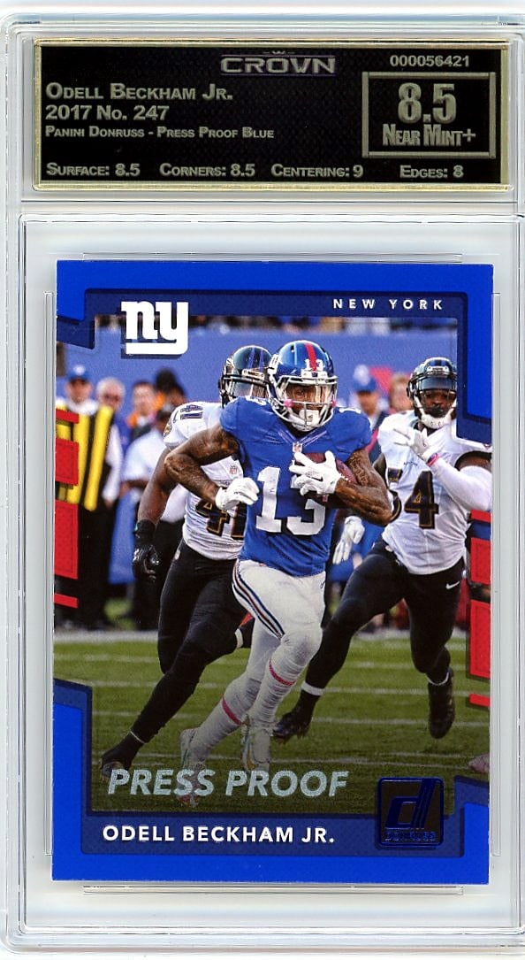 2017 Odell Beckham Jr. Panini Donruss Press: This is a 2017 Odell Beckham Jr. card from the Panini Donruss Press Proof Blue set, card number 247. It's a professionally graded slab that captures OBJ during his prime years in the NFL. The Press