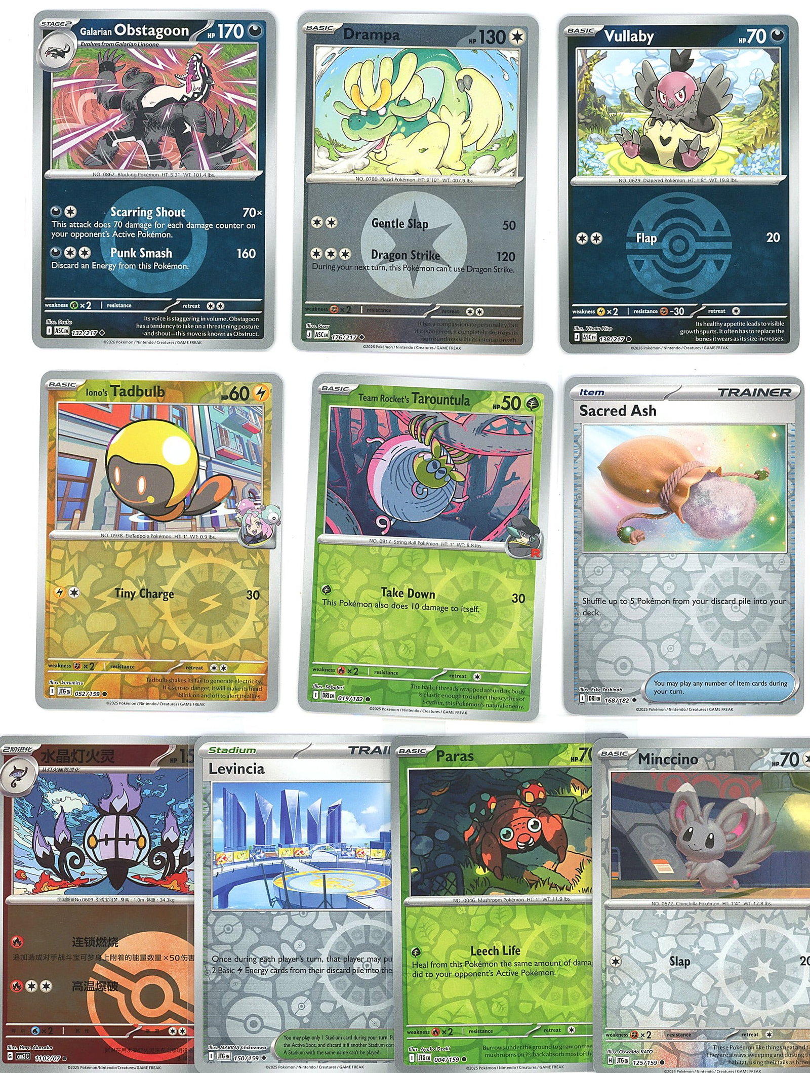 11-Card Lot Modern Holo Pokemon Trading Cards TCG: This lot contains 11 modern holographic Pokemon trading cards in Near Mint condition, displayed exactly as shown in the photograph. The cards feature a mix of Pokemon species with visible holo foil