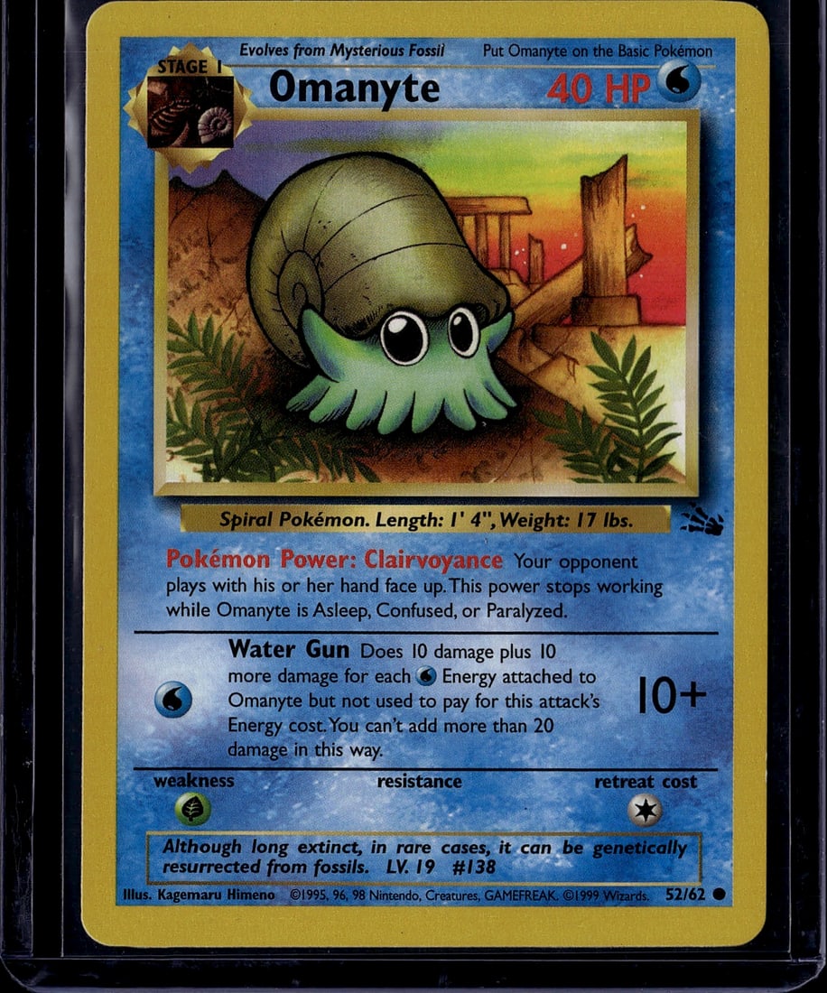 1999 Pokemon Base Set Omanyte #52/62 Stage 1: This is an authentic 1999 Pokemon Trading Card Game Base Set Omanyte card (#52/62), a Stage 1 Spiral Pokemon that evolves from Mysterious Fossil. The card features classic artwork by Kagemaru Himeno