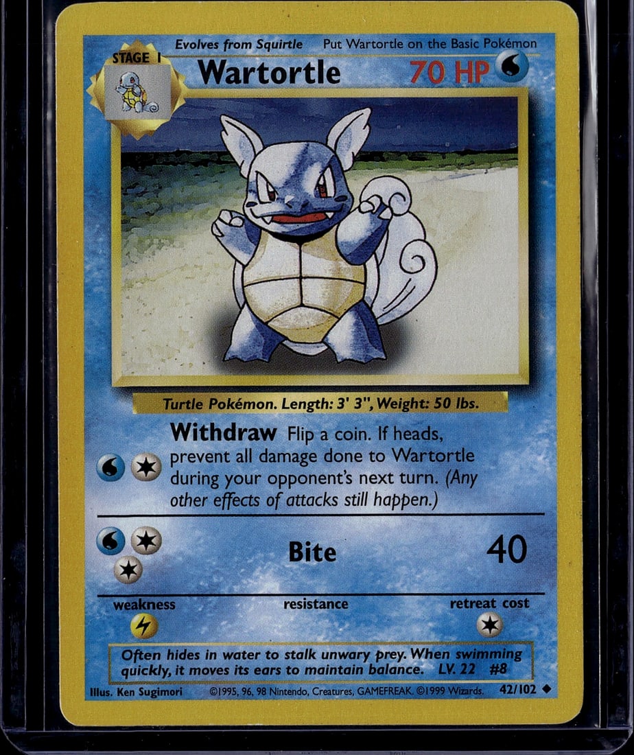 Wartortle 42/102 Base Set 1999 Pokemon Card: This is an authentic Wartortle Pokemon trading card from the original 1999 Base Set, card number 42/102. The card features the iconic Stage 1 Water-type Pokemon evolving from Squirtle, with artwork