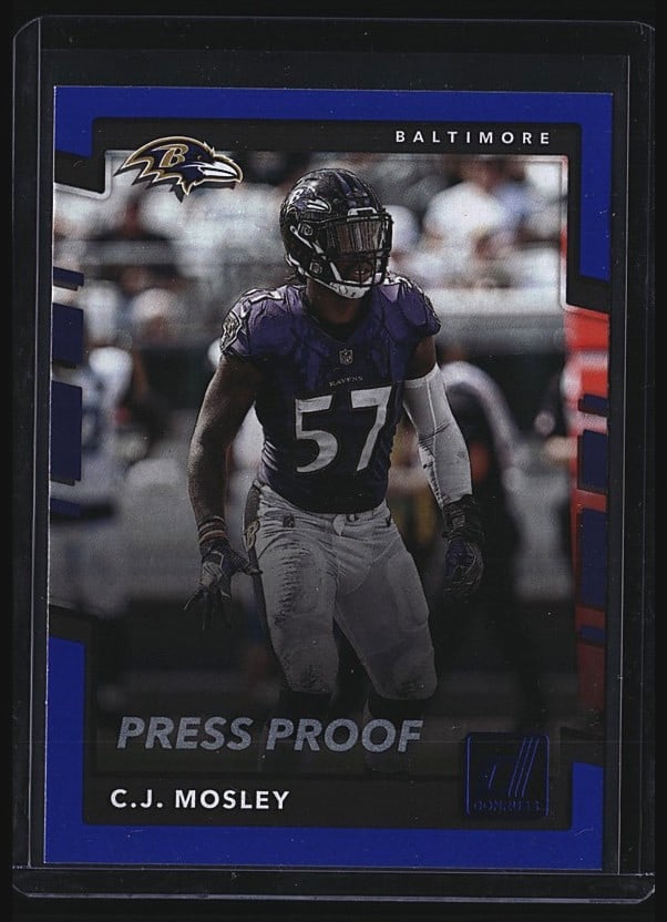 2017 Panini Donruss C.J. Mosley #189 Press Proof: 2017 Panini Donruss Football C.J. Mosley #189 Press Proof variant. Features the Baltimore Ravens linebacker in full uniform during game action. This press proof edition is a premium parallel variant