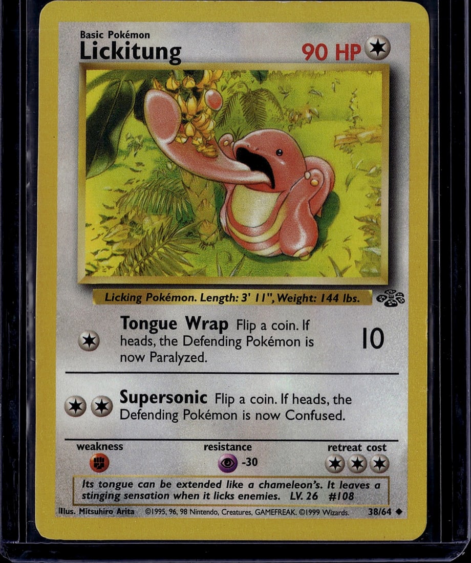Lickitung Base Set 38/64 Pokemon Card 1999: This is an original 1999 Pokemon Trading Card Game Base Set Lickitung card (#38/64). This Basic Pokemon features the classic artwork by Mitsuhiro Arita and showcases Lickitung's iconic extended tongue