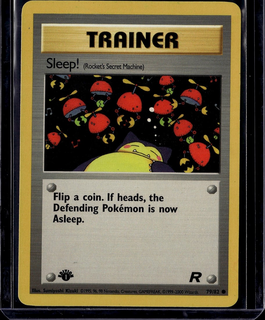 Sleep Trainer Rocket's Secret Machine Pokemon: This is an ungraded Pokemon Trainer card from the original Base Set released in 1999. Sleep! (Rocket's Secret Machine) is card number 79 out of 82 in the set. The card features artwork by Sumiyoshi