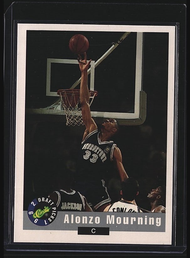 1992 Classic Draft Picks #60 Alonzo Mourning: 1992 Upper Deck basketball card featuring Alonzo Mourning in action. The card shows Mourning shooting over a defender, captured during his early NBA career. Front displays player name and team informa