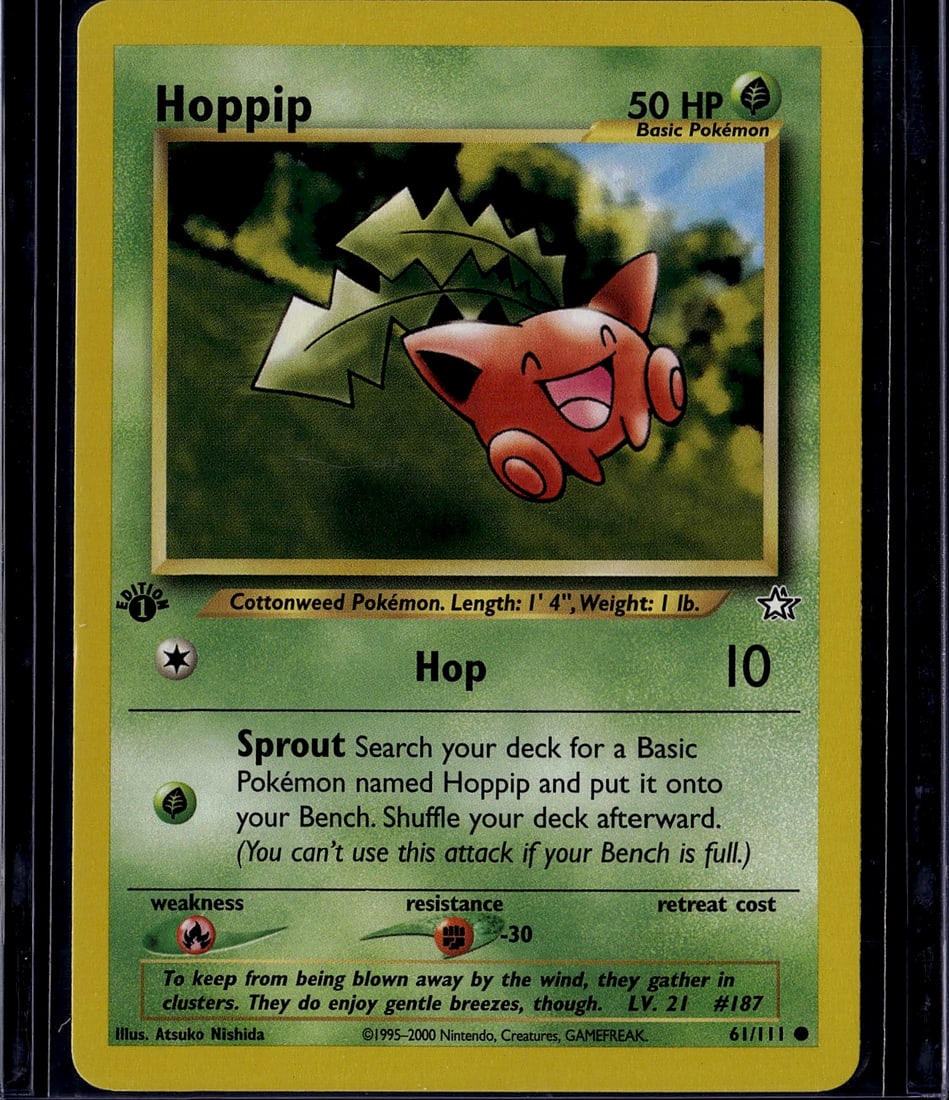 2000 Pokemon Neo Genesis Hoppip 61/111 Near Mint: This is a near mint condition Hoppip Pokemon card from the Base Set, produced in 2000 by The Pokemon Company. Card number 61/111, this Grass-type Basic Pokemon features the iconic artwork by Atsuko