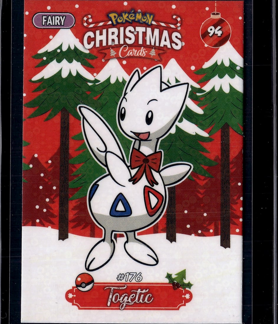 Togetic #176 Fairy Pokemon Christmas Card 2024: This is an official Pokemon Christmas Card featuring Togetic, the Fairy-type Pokemon, from the 2024 Pokemon Christmas Cards collection. The card showcases beautiful festive artwork with Togetic wearin