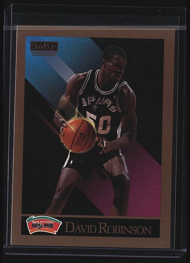 1990 Skybox David Robinson #260 Basketball Card: 1990 Skybox #260 David Robinson rookie card featuring the San Antonio Spurs center. Card displays crisp imagery with excellent centering and color saturation typical of high-grade raw Skybox issues fr