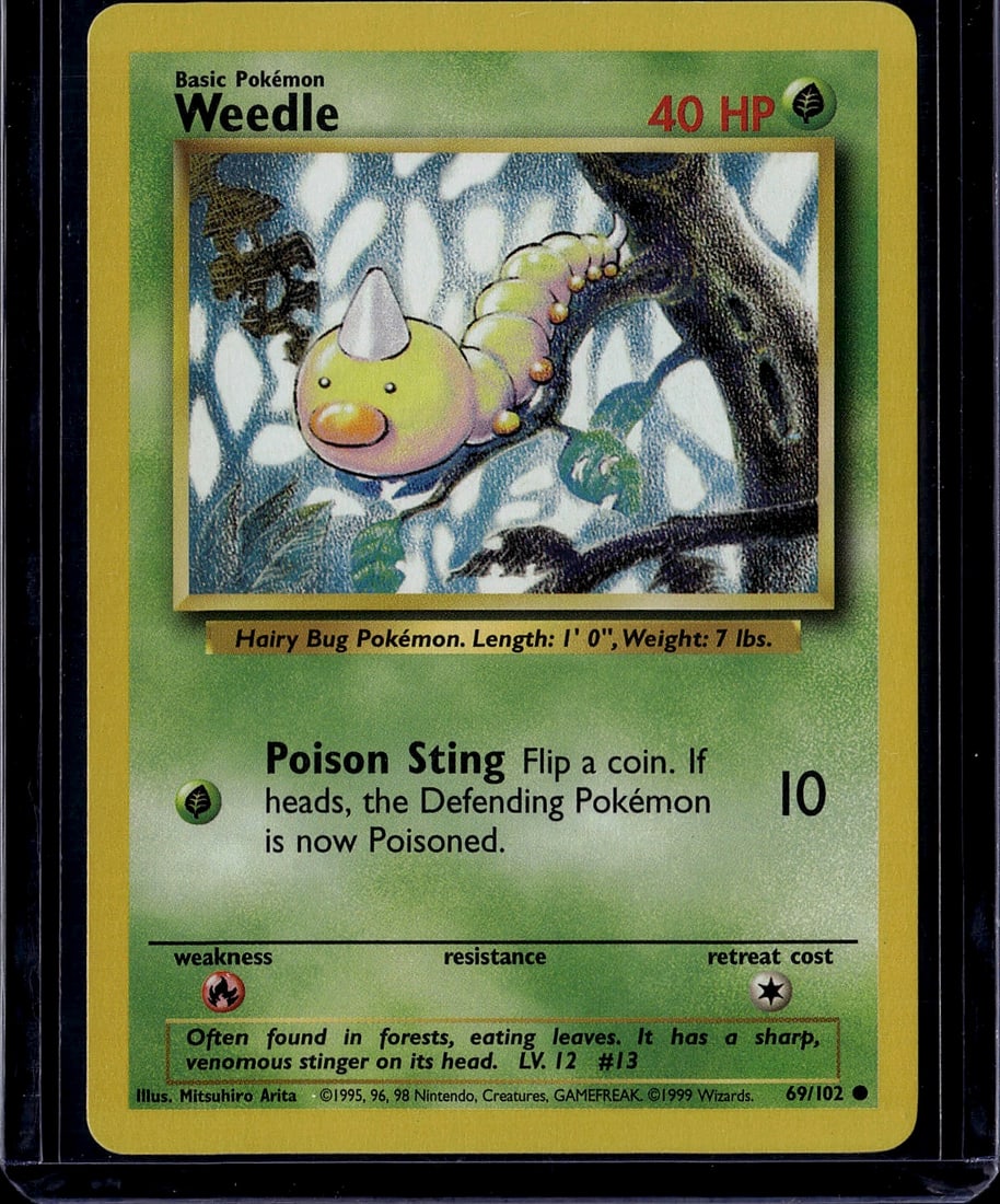 1999 Pokemon Base Set Weedle #69/102 Holo Card: This is a vintage 1999 Pokemon Base Set Weedle holographic card (#69/102), one of the iconic early Pokemon Trading Card Game releases. The card features artwork by Mitsuhiro Arita and showcases