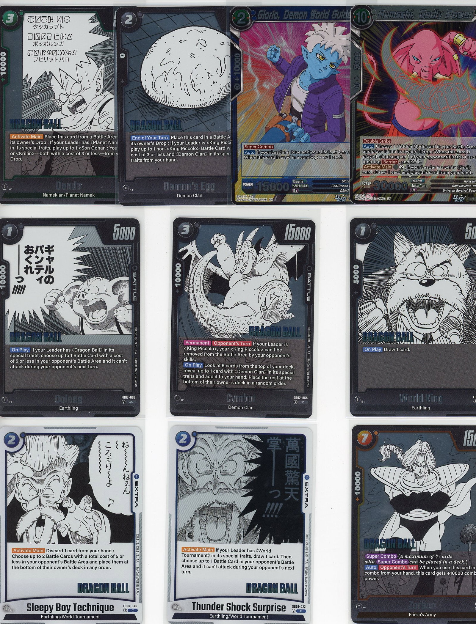 Lot of 10 Dragon Ball Z Foil Cards - Demon Clan: This lot contains 10 Dragon Ball Z foil cards featuring characters from the iconic anime series. The collection includes cards from multiple sets and themes, showcasing popular characters and moments