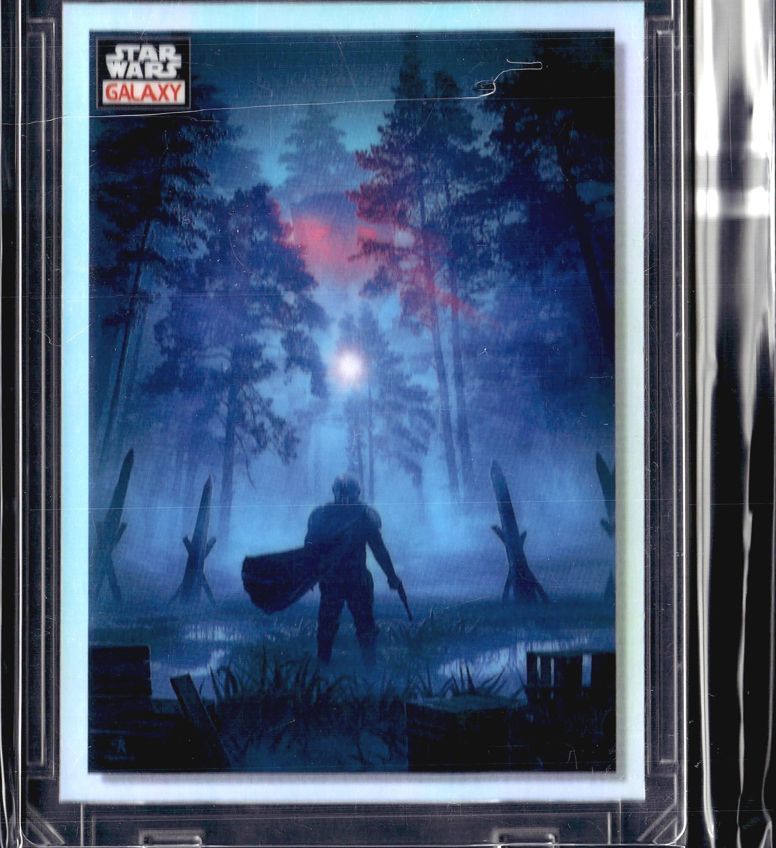 2023 Topps Chrome Star Wars Galaxy #45 Take The: This is card #45 from the Topps Star Wars Galaxy trading card set, titled 'Take the Bait.' The card features a dramatic atmospheric artwork depicting the Mandalorian standing in a misty swamp
