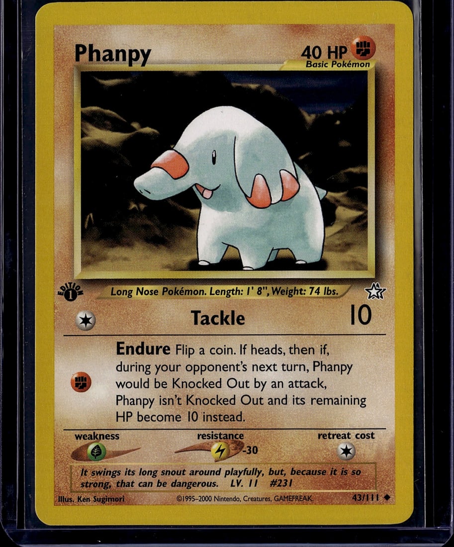 2000 Pokemon Neo Genesis Phanpy 43/111 Near Mint: This is an authentic Phanpy Pokemon Trading Card from the Base Set era, printed in 2000 by The Pokemon Company and illustrated by Ken Sugimori. Card #43/111 features the iconic long-nosed elephant Pok