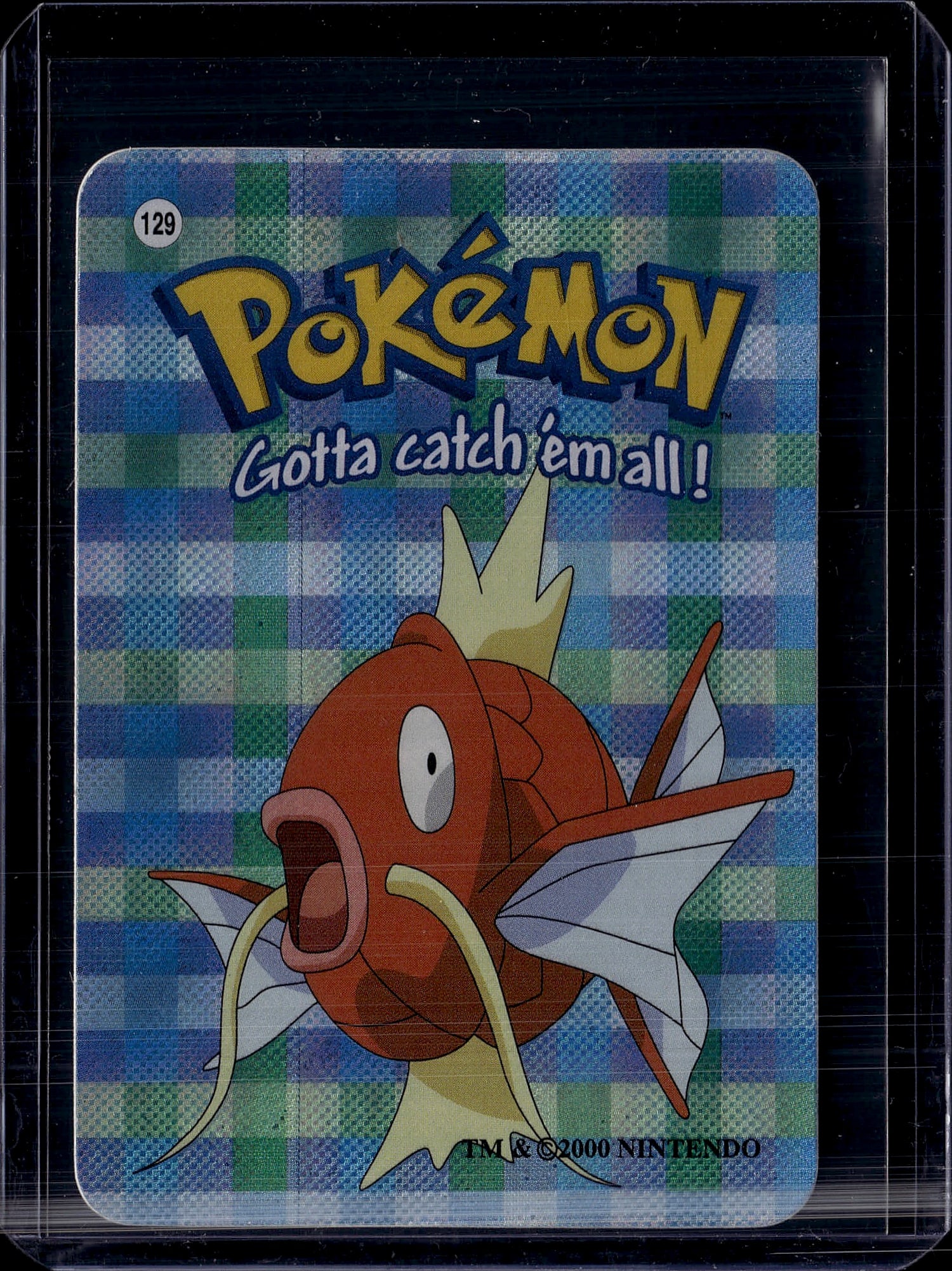 1996 Nintendo Base Set Japanese Magikarp #129: Magikarp #129 from the Japanese Pokemon Base Set (known in Japan as 'Expansion Pack'), released October 20, 1996 by Nintendo. In the English Base Set, Magikarp is card #35 - card #129 belongs