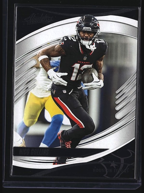 2025 Panini Absolute Football #87 Nico Collins: 2025 Panini Absolute Football card #87 featuring Nico Collins, wide receiver for the Houston Texans. This raw single shows Collins in action wearing his Texans black jersey with gold and blue