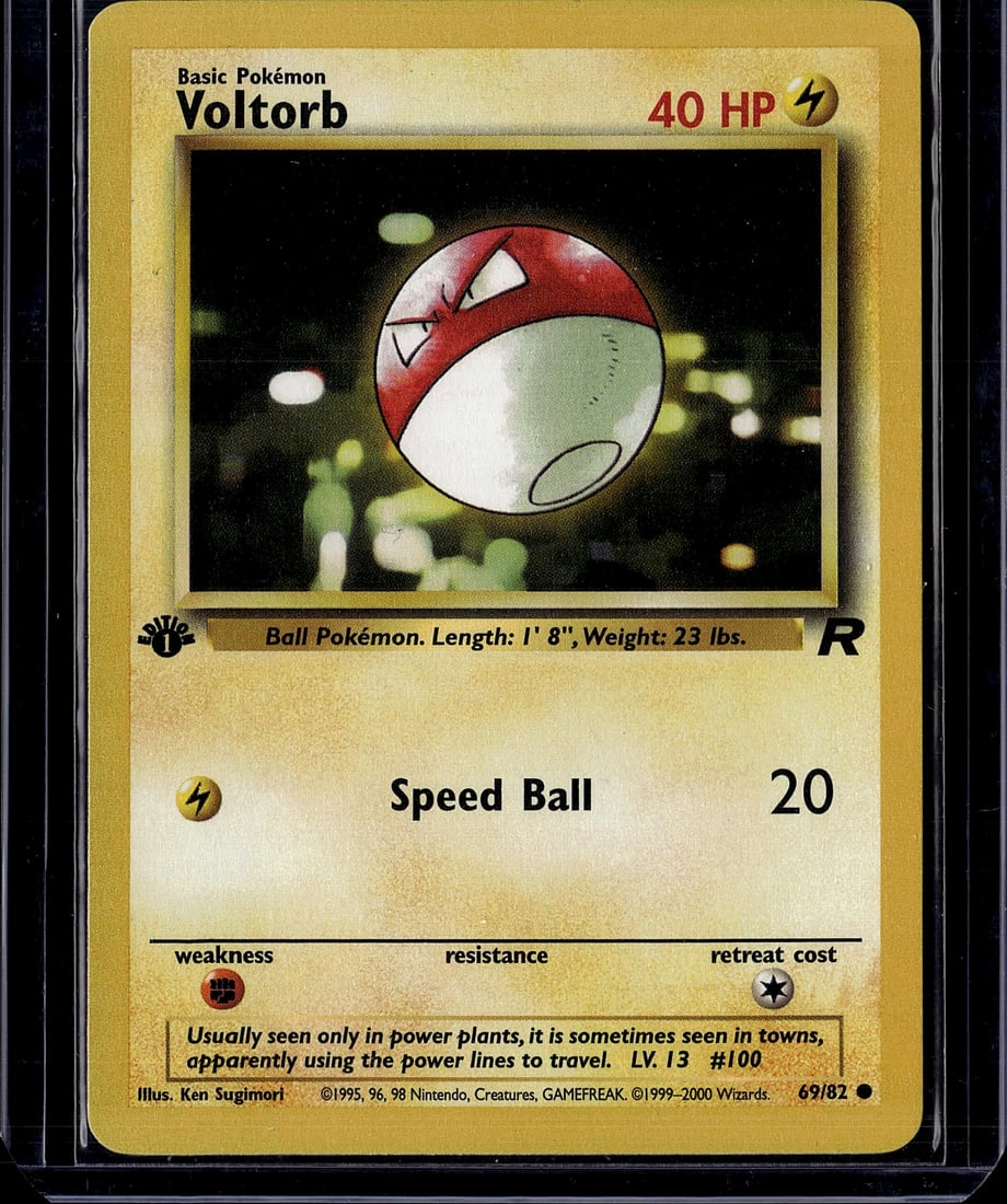 1999 Pokemon Base Set Voltorb #69/82 Basic: This is an authentic 1999 Pokemon Trading Card Game card featuring Voltorb from the iconic Base Set. The card displays the classic artwork by Ken Sugimori, showing the Ball Pokemon in its