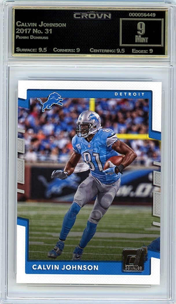 2017 Calvin Johnson Panini Donruss #31 Crown 9: This is a 2017 Calvin Johnson Panini Donruss card #31, professionally graded and authenticated. The card has been evaluated by Crown grading and assigned a grade of 9, indicating Mint condition. This