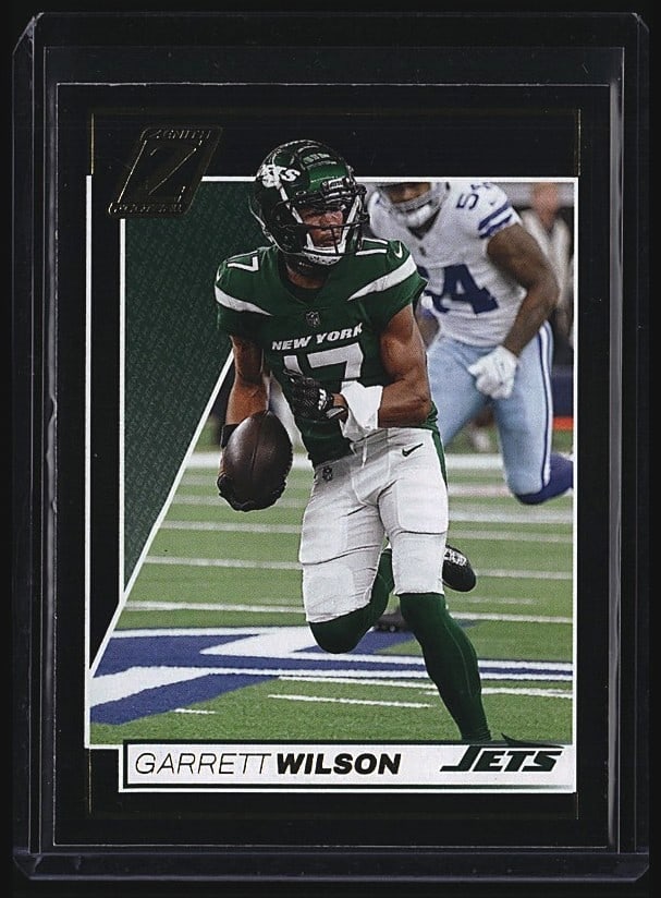 2022 Panini Clearly Donruss Garrett Wilson #56: Raw single sports card featuring Garrett Wilson, wide receiver for the New York Jets. This is a 2022 Panini Score card #373 showcasing Wilson in his Jets uniform during his rookie season. The card is