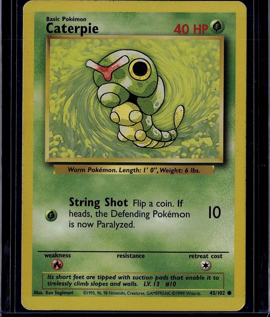 1999 Pokemon Base Set Caterpie #45/102 Raw Card: This is an original 1999 Pokemon Trading Card Game Base Set Caterpie card (#45/102), featuring the iconic Worm Pokemon illustrated by Ken Sugimori. The card displays vibrant green and yellow coloring
