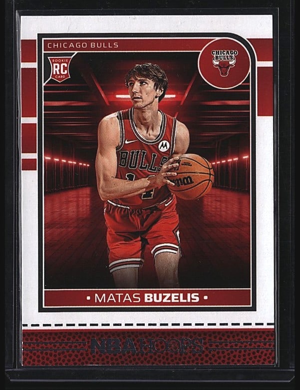2024 Panini NBA Hoops #241 Matas Buzelis Chicago: 2024 Panini NBA Hoops #241 Matas Buzelis rookie card featuring the Chicago Bulls draft pick. This raw single showcases the promising wing player in his Bulls uniform holding a basketball on the card f