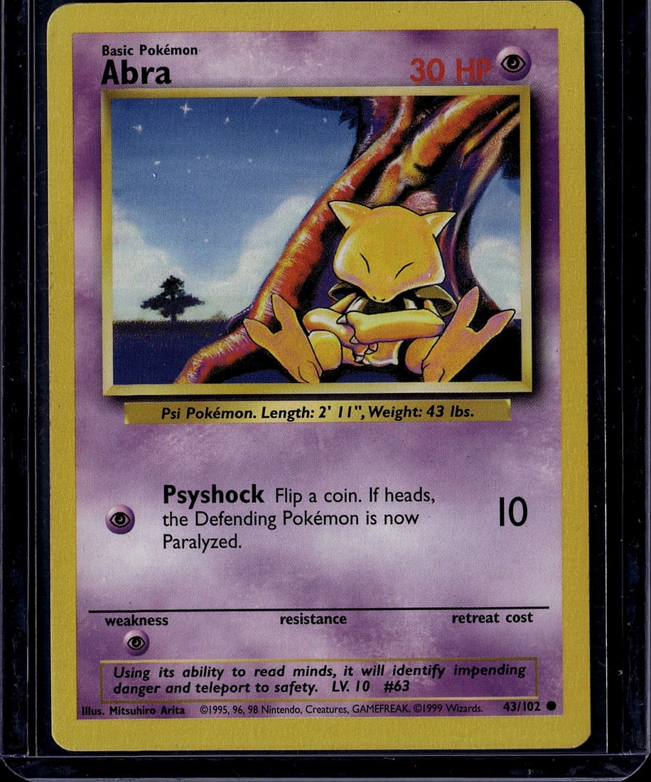 1999 Pokemon Base Set Abra 43/102 Psych Psychic: This is an original 1999 Pokemon Trading Card Game Base Set Abra card (43/102), featuring the iconic Psi Pokemon. The card displays Abra as a Basic Psychic-type Pokemon with 30 HP, illustrated by Mits
