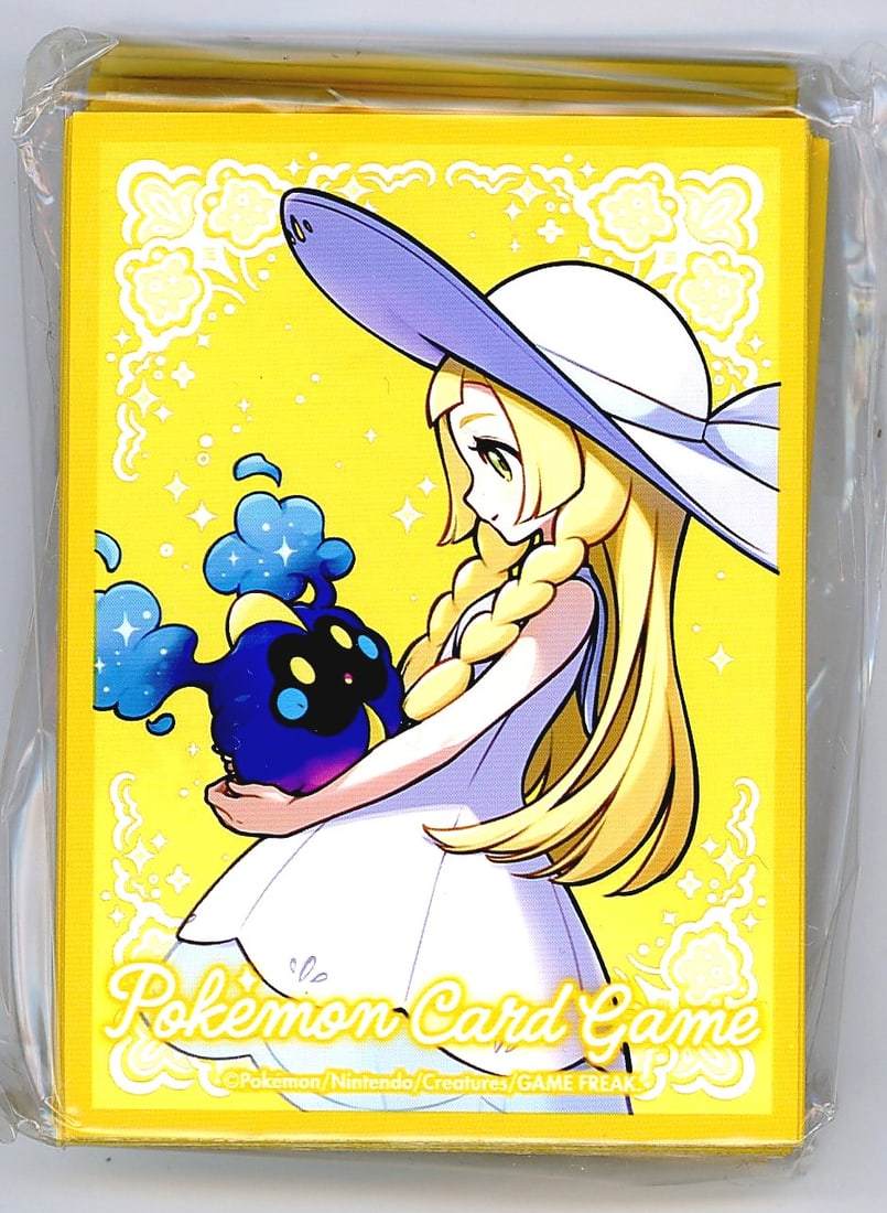 2017 Pokemon Mega Brave Lillie & Riombee 65 Card: This sealed pack of official Pokemon Card Game deck sleeves features Lillie and Cosmog artwork on a vibrant yellow background with a decorative white lace border. The sleeves showcase Lillie - the ico