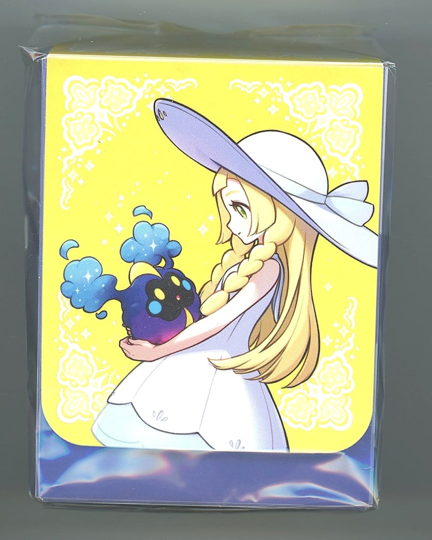2016 Pokemon Mega Evolutions Lillie & Riombee: This is an official Pokemon Promo Deck Box featuring artwork of Lillie, the iconic trainer from the Alola region, holding Cosmog against a vibrant yellow background with white floral design accents. T